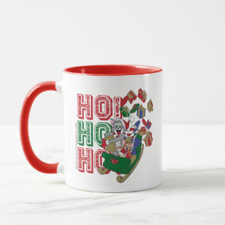 Taza Tom y Jerry entregando regalos en un Sleigh