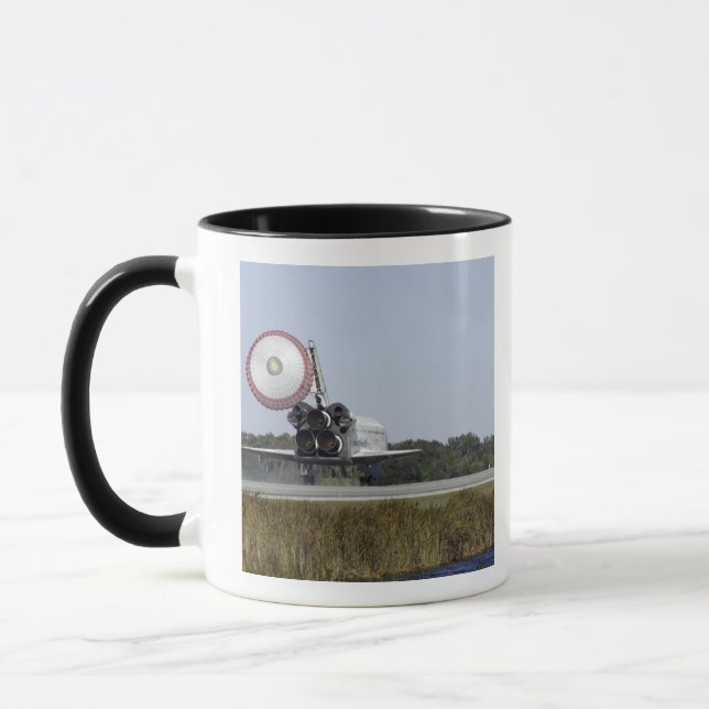 Taza Transporte espacial Atlantis despliega su tubo de  (Izquierda)