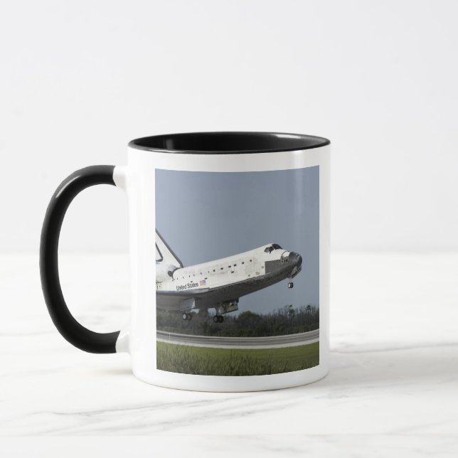 Taza Transporte espacial El descubrimiento aterriza en  (Izquierda)