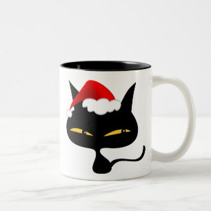 Taza traviesa del gatito del navidad