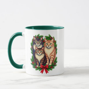 Taza Trío de gatos de Navidad con corona de siempreviva