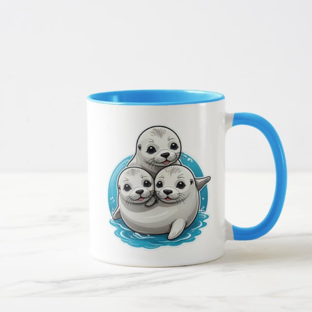 Taza Trois adorables bébés phoques aux grands yeux. (Derecha)