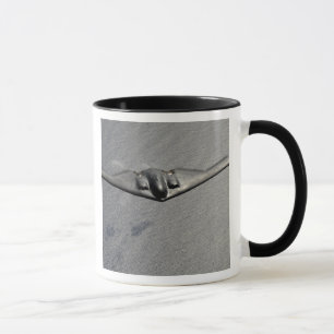 Taza Un alcohol B-2 vuela sobre el Océano Pacífico
