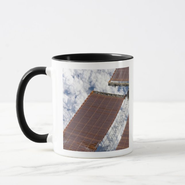 Taza Un arreglo solar reparado (Izquierda)