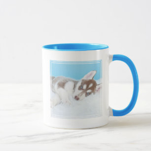 Taza Un cachorro cocido en la manta