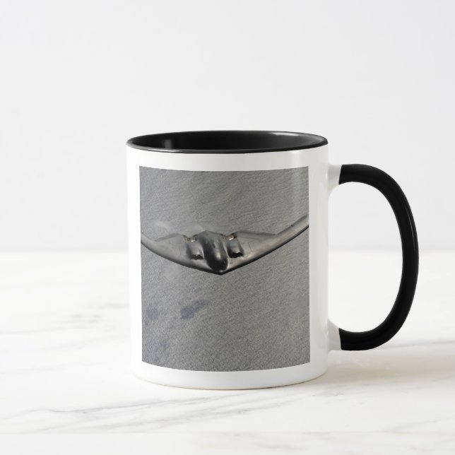 Taza Un espíritu B-2 vuela sobre el Océano Pacífico (Derecha)