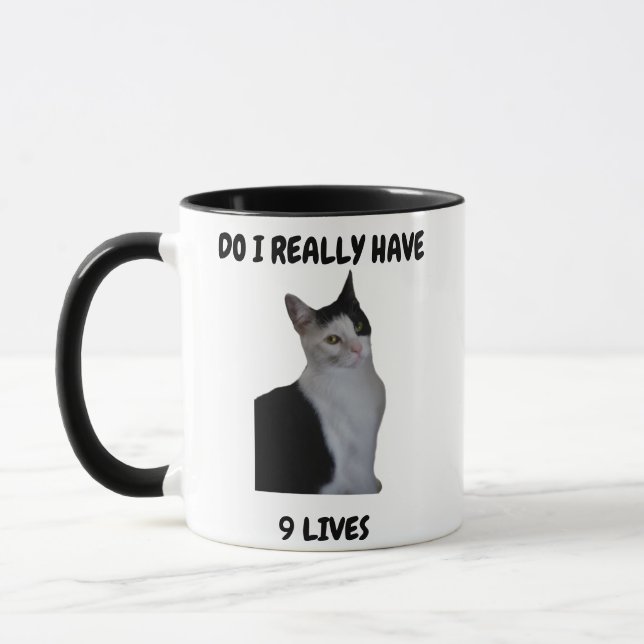 Taza Un gato curioso con una pregunta (Izquierda)