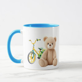 Taza Un ourson en peluche devant un vélo d'enfant.