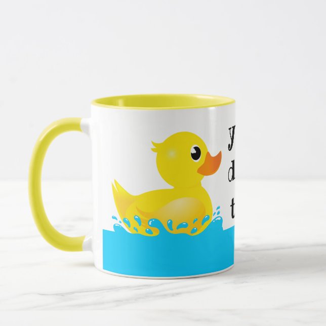 Taza Un puño de goma amarillo chispeado (Izquierda)