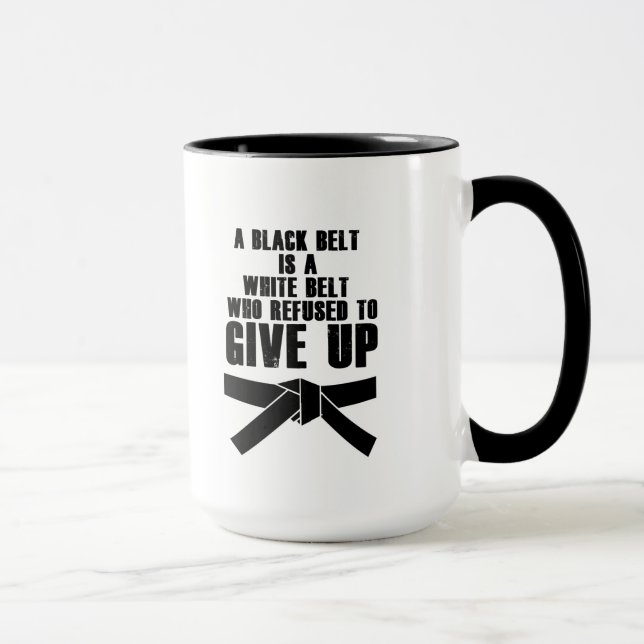 Taza Una correa negra es un karate blanco el Taekwondo (Derecha)