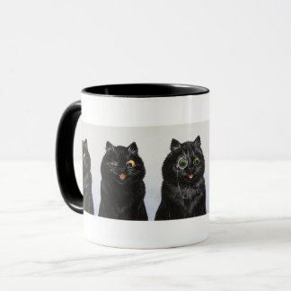 Taza Una fila de gatos negros por Louis Wain