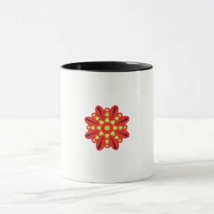 Taza una flor roja y amarilla con puntos negros