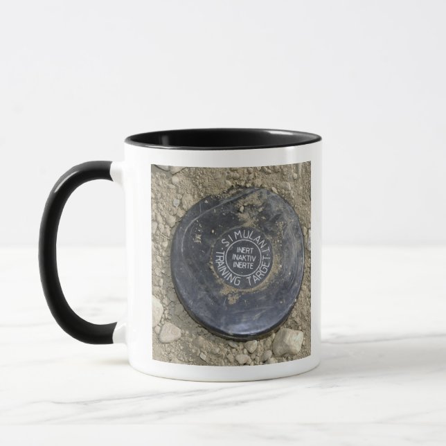 Taza Una mina terrestre simulada (Izquierda)