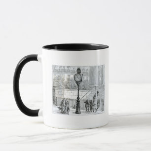 Taza Una muchedumbre admira un reloj neumático