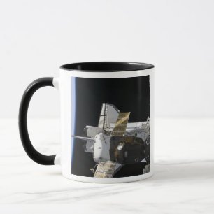 Taza Una nave espacial atracada de Soyuz