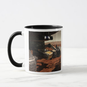 Taza Una opinión del primer del brazo en Marte de la