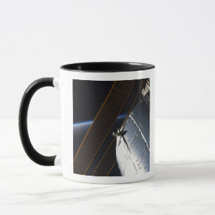 Taza Una porción de la estación espacial internacional