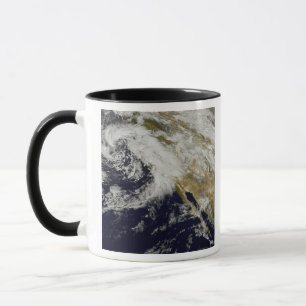 Taza Una serie de tormentas fuertes con los vientos