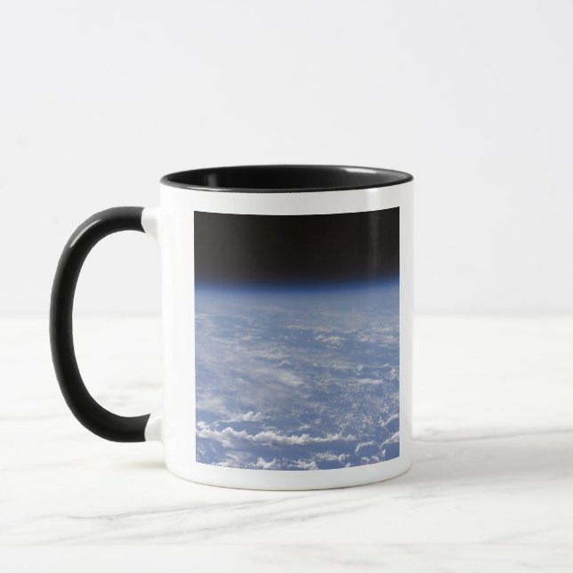 Taza Una visión de horizonte oblicua de la atmósfera te (Izquierda)