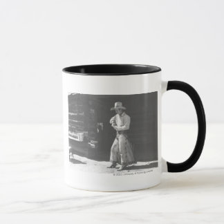 Taza Vaquero que come de una manteca de cacahuete Can.