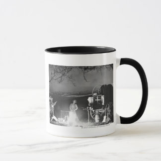 Taza Vaqueros que juegan y que cantan alrededor de una