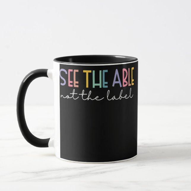 Taza Ver la educación especial de Able Not the Label (Izquierda)