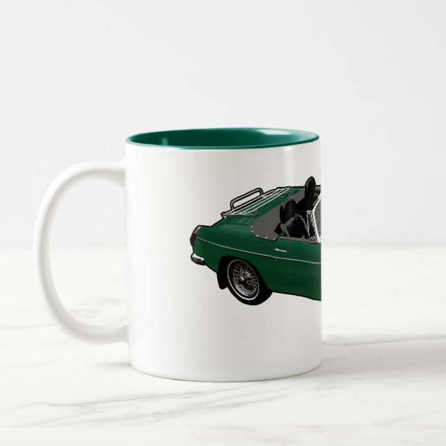 Taza verde del automóvil descubierto (Izquierda)