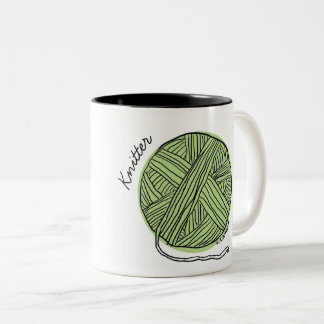 Taza verde del calcetero de la bola del hilado