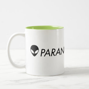 Taza verde extranjera de Paranormalis