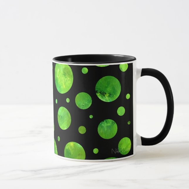 Taza verde negra y blanca de los lunares (Derecha)