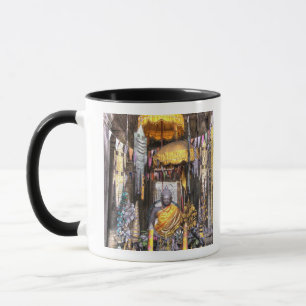 Taza Vista del área del altar dentro del templo budista