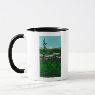 Taza Vista lejana de la cima y ciudad del glaciar