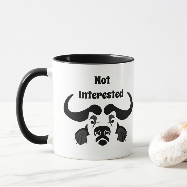 Taza Whimsical Cape Buffalo, en Cojín decorativo de tin (Con donut)