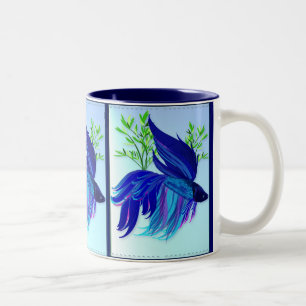 Tazas siamesas azules grandes de los pescados que