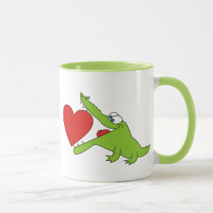 Te amo, cocodrilo lindo con una taza del corazón