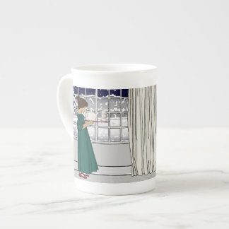 Té en una taza de la porcelana de hueso de la