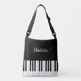 Teclado de piano, bolso crossbody blanco y negro