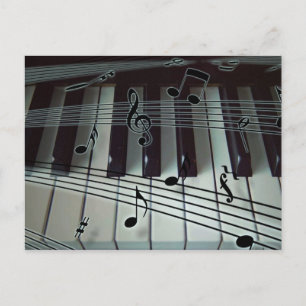 Teclado de piano u órgano con notas musicales