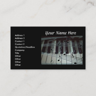 Teclado de piano y tarjeta de visita de las notas