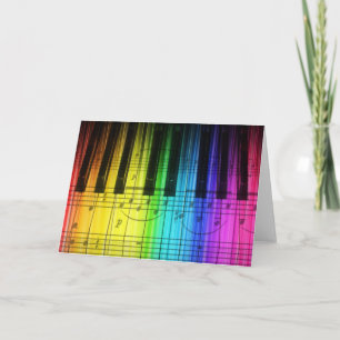 Teclado y notas de piano del arco iris