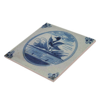 Teja azul antigua de Delft - pato en el agua