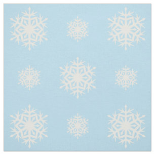 Tela azul claro con estampado de copo de nieve