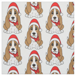 Tela Basset Hound en el gorra de Santa en el navidad