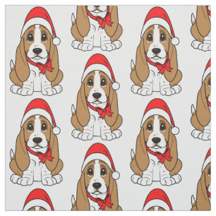 Tela Basset Hound en el gorra de Santa en el navidad