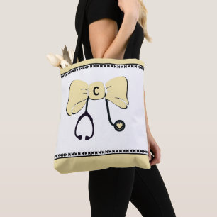 Tela Bolso tote de color amarillo y blanco con arco de