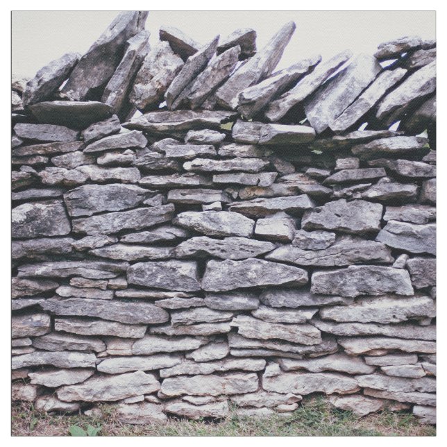 Tela cerca apilada robusta de las piedras (Retal)