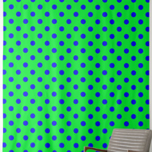 Tela Diseño de patrón de lunares azules sobre verde