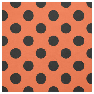 Tela El polka negro se pone sobre el naranja