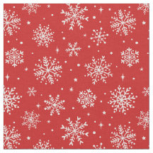 Elegantes copos de nieve blancos sobre fondo rojo