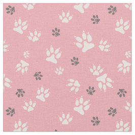 Tela  Huellas de perro en un fondo rosado